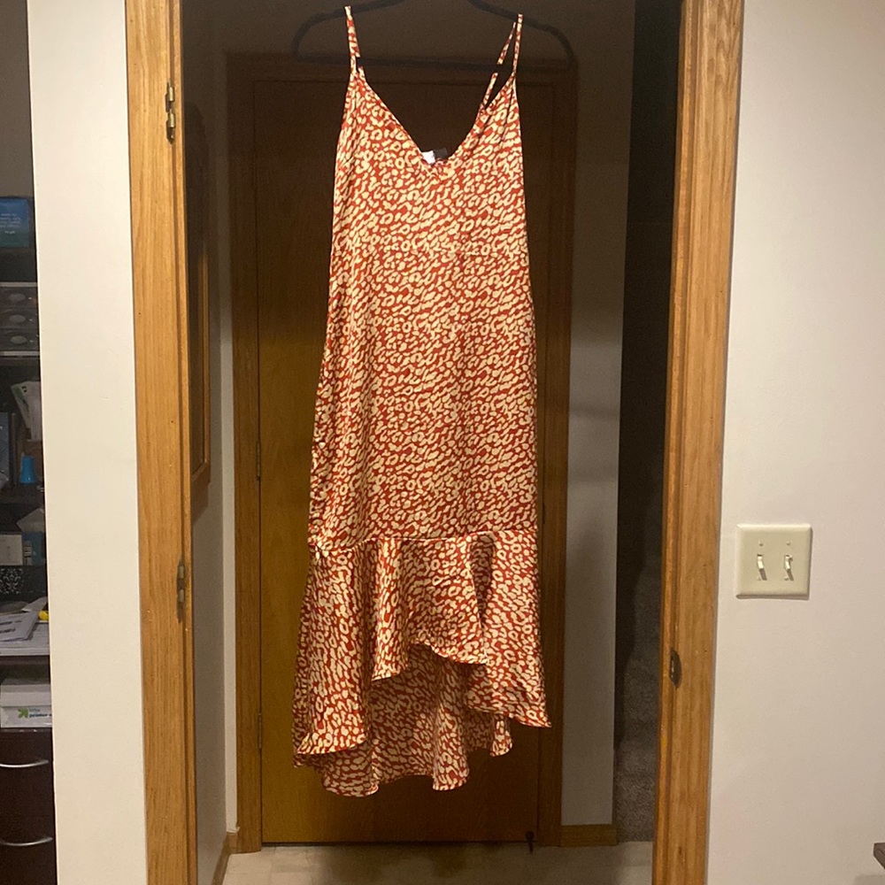 Mermaid style dress with asymmetrical hem